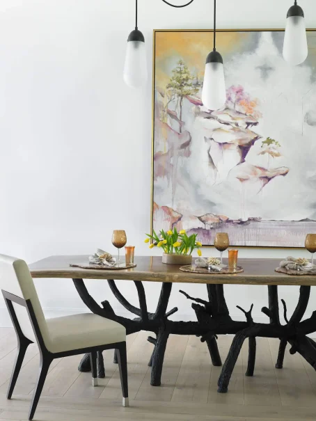 Dining room in Mediterra with artwork on wall